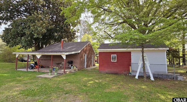 1034 N NC Highway 37, Gates, NC 27937 - view of outbuilding with fence and an outbuilding