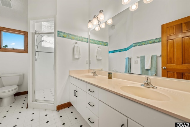 full bath with visible vents, a sink, and a stall shower