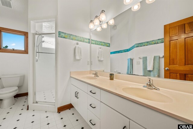 103 E Sea Spray Ct Lot 27, Nags Head, NC 27959 - full bath with visible vents, a sink, and a stall shower