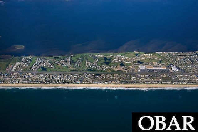 103 E Sea Spray Ct Lot 27, Nags Head, NC 27959 - aerial view at night featuring a water view