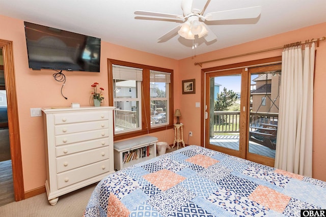 carpeted bedroom with ceiling fan, baseboards, and access to exterior