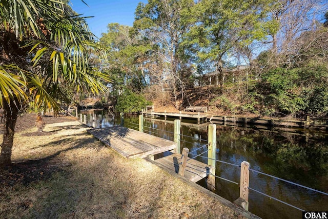 view of dock with a water view