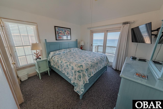 22183 Sea Gull St Lot 13, Rodanthe, NC 27968 - bedroom featuring access to outside, dark carpet, baseboards, and vaulted ceiling