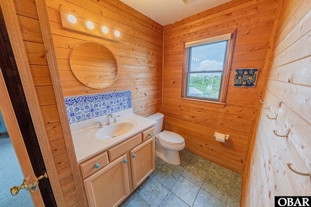 26224 Cutlass Ln Lot 27, Salvo, NC 27972 - half bathroom featuring wooden walls and vanity