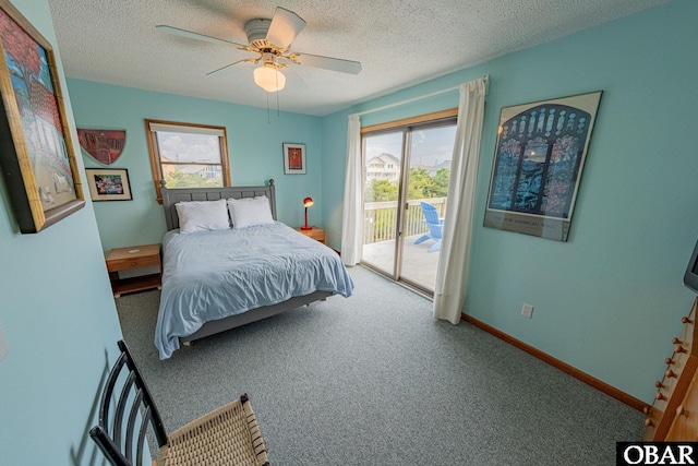 26224 Cutlass Ln Lot 27, Salvo, NC 27972 - bedroom with access to exterior, carpet, multiple windows, a textured ceiling, and ceiling fan