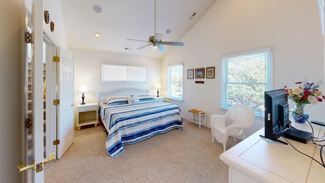 bedroom with light carpet, ceiling fan, high vaulted ceiling, and visible vents