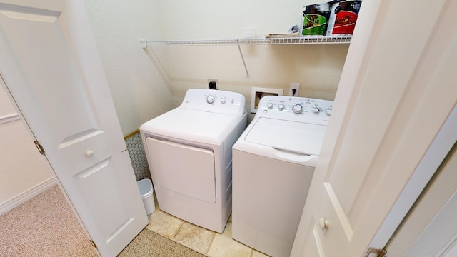 laundry area featuring laundry area and independent washer and dryer