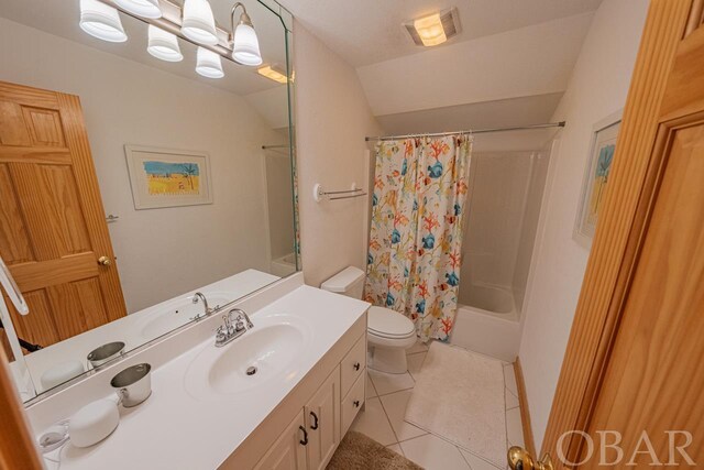 full bathroom featuring toilet, visible vents, vaulted ceiling, tile patterned floors, and shower / bath combo with shower curtain