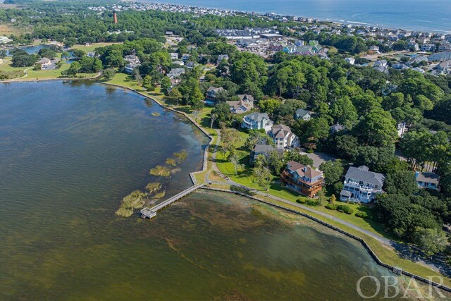 aerial view with a water view and a residential view