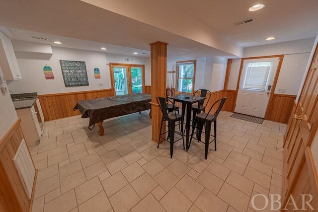 game room featuring recessed lighting, wooden walls, pool table, visible vents, and wainscoting