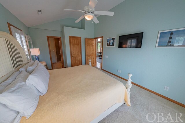 carpeted bedroom with a ceiling fan, visible vents, vaulted ceiling, and baseboards