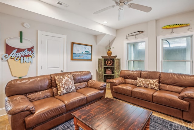 living area with ceiling fan, visible vents, and recessed lighting