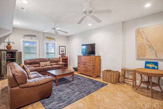 living room featuring baseboards, a ceiling fan, visible vents, and recessed lighting