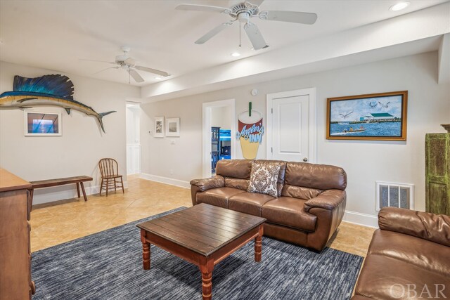 living area featuring light tile patterned floors, baseboards, visible vents, a ceiling fan, and recessed lighting