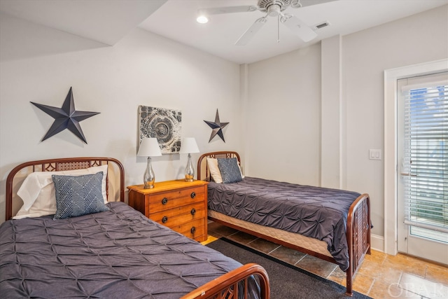 bedroom featuring visible vents and a ceiling fan