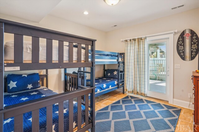 bedroom with access to outside, recessed lighting, visible vents, and baseboards