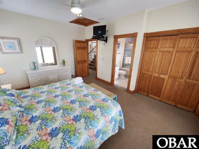 bedroom featuring ensuite bathroom, ceiling fan, baseboards, and light colored carpet