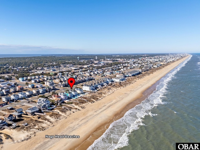 aerial view with a water view, a residential view, and a beach view