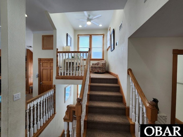 stairway featuring recessed lighting, visible vents, and a ceiling fan