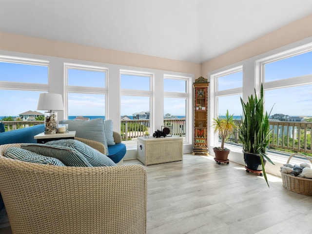 1556 Sandpiper Rd Lot # 33, Corolla, NC 27927 - sunroom / solarium featuring plenty of natural light and wood finished floors