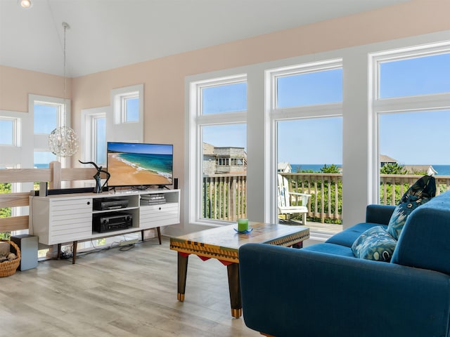 1556 Sandpiper Rd Lot # 33, Corolla, NC 27927 - living area with high vaulted ceiling and light wood-style floors