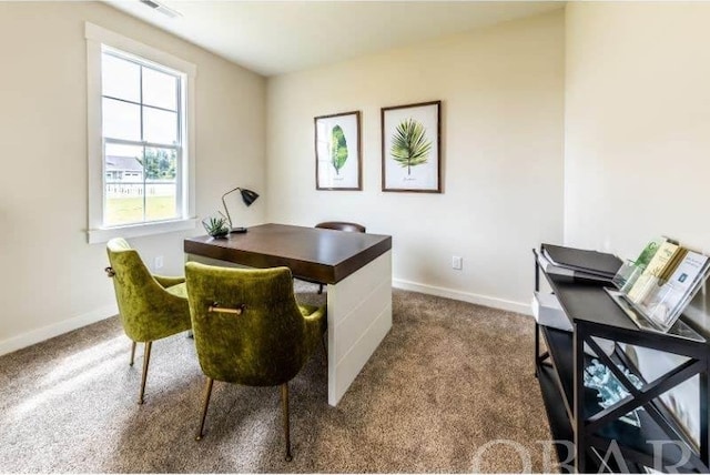 home office featuring carpet flooring, visible vents, and baseboards