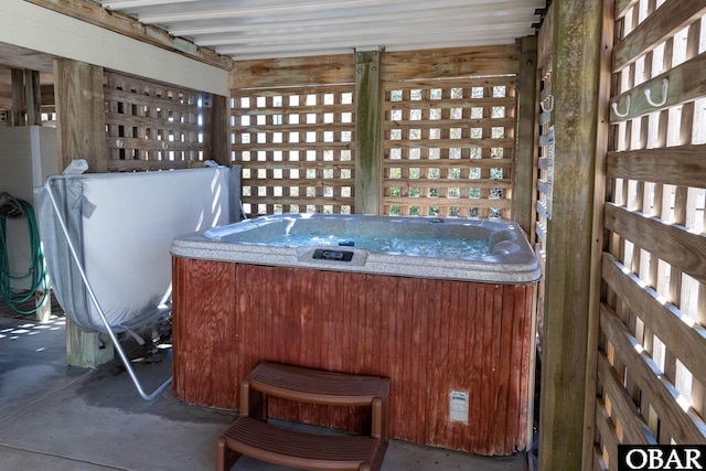 view of patio / terrace featuring a hot tub