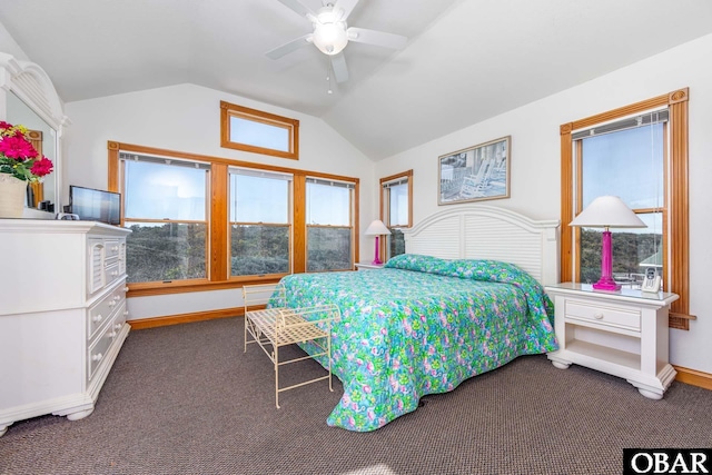 bedroom with baseboards, vaulted ceiling, a ceiling fan, and dark colored carpet