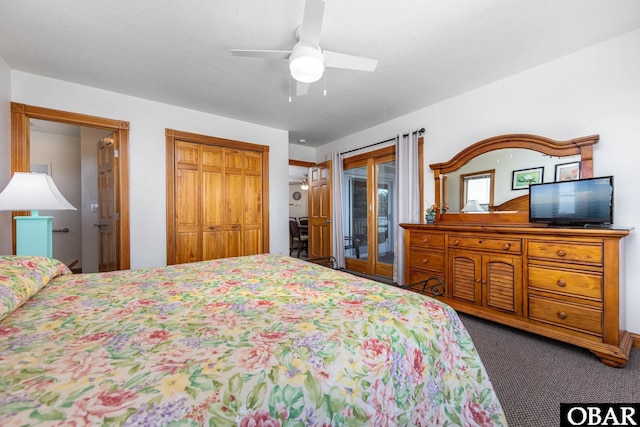 bedroom with access to outside, a closet, dark carpet, and a ceiling fan