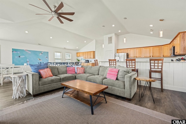 living area featuring recessed lighting, visible vents, and dark wood finished floors