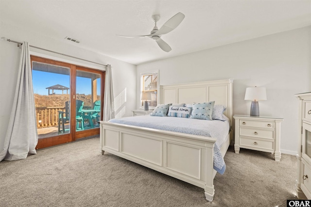 bedroom featuring ceiling fan, light colored carpet, visible vents, and access to exterior