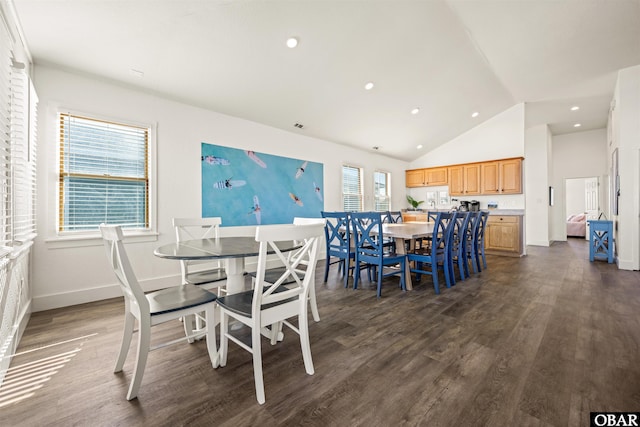 dining space featuring high vaulted ceiling, recessed lighting, dark wood finished floors, and baseboards