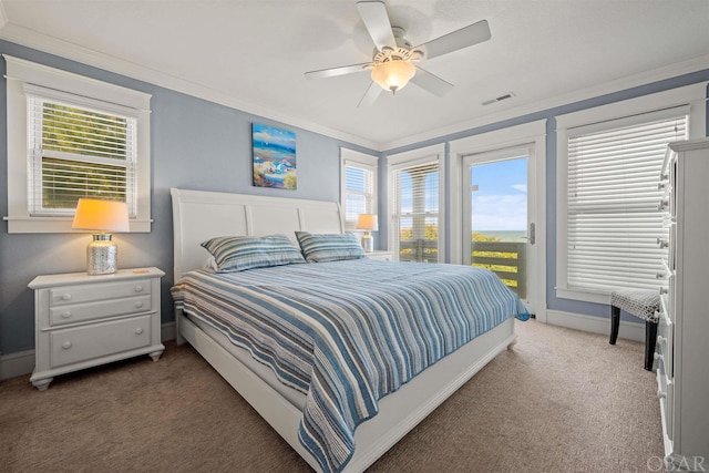 bedroom with access to exterior, visible vents, dark carpet, ornamental molding, and baseboards