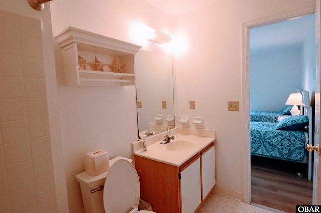 1006 Swordfish Way Unit 1006, Kitty Hawk, NC 27949 - bathroom featuring toilet, ensuite bathroom, and vanity