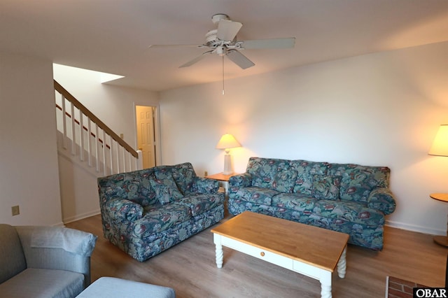 1006 Swordfish Way Unit 1006, Kitty Hawk, NC 27949 - living room featuring ceiling fan, wood finished floors, baseboards, and stairs