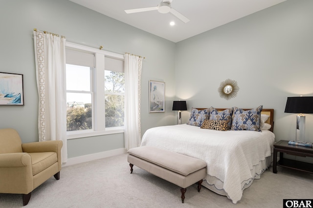 bedroom featuring a ceiling fan, recessed lighting, light carpet, and baseboards