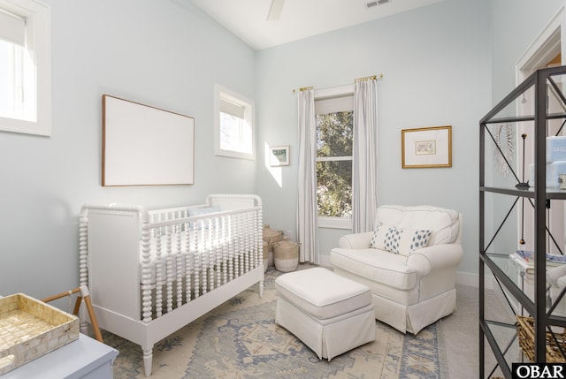 bedroom with visible vents and baseboards