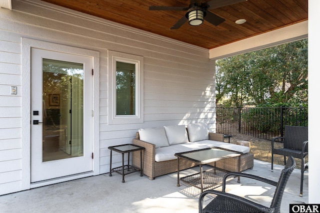 view of patio featuring ceiling fan, an outdoor hangout area, and fence