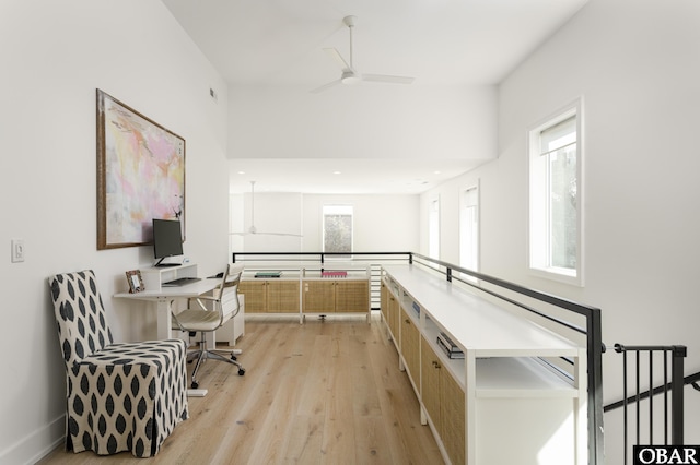 office featuring light wood-style floors, recessed lighting, ceiling fan, and baseboards