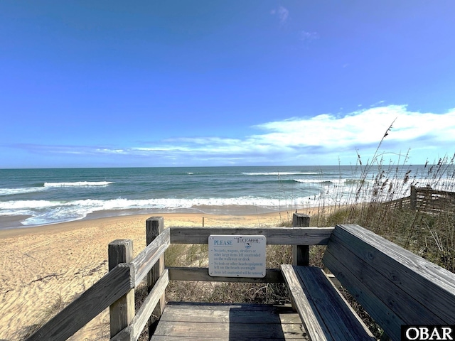 property view of water with a beach view