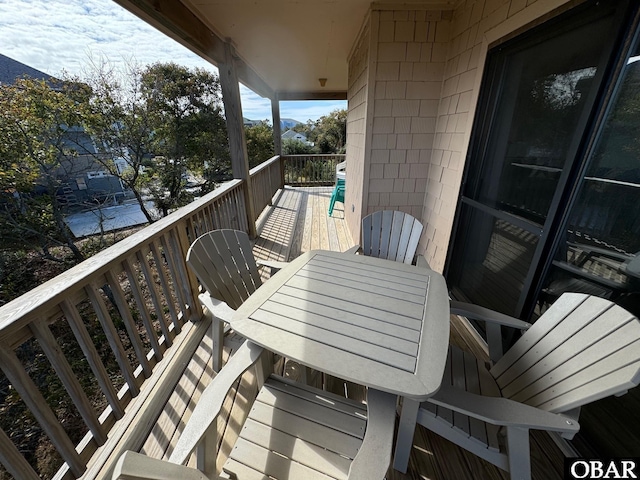 balcony featuring outdoor dining area