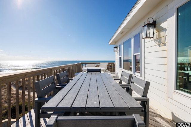 57236 Atlantic View Dr Lot 3, Hatteras, NC 27943 - wooden deck featuring outdoor dining area and view of water and beach