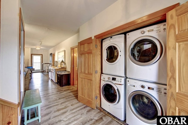57236 Atlantic View Dr Lot 3, Hatteras, NC 27943 - laundry room featuring estacked washer and dryer and light wood-style flooring