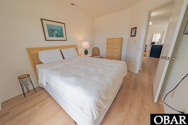 804 S Memorial Blvd Unit 3-D, Kill Devil Hills, NC 27948 - bedroom with light wood-style floors and baseboards