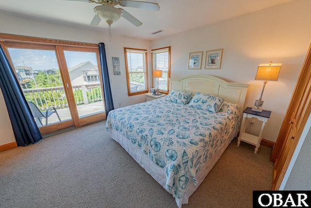 bedroom featuring a ceiling fan, baseboards, visible vents, access to outside, and carpet flooring