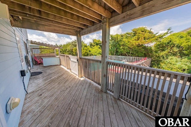 wooden deck featuring fence