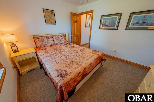 carpeted bedroom with baseboards