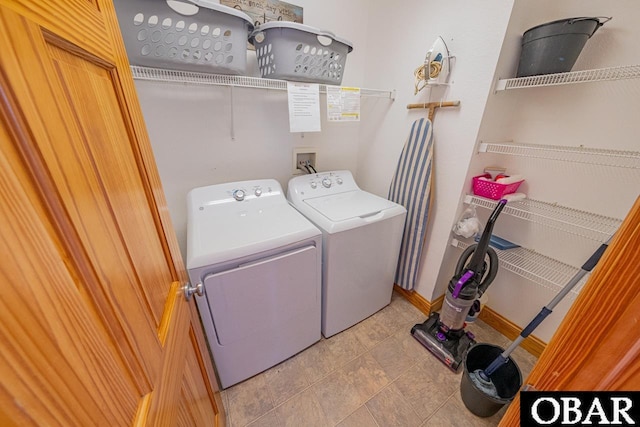 laundry area with laundry area and washing machine and dryer