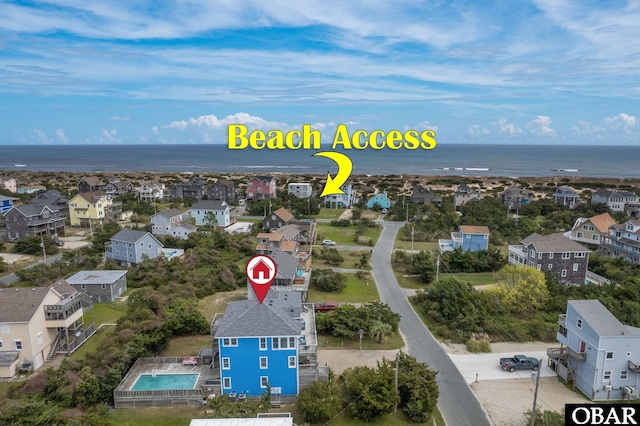 aerial view with a residential view and a water view