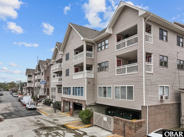 view of building exterior with a residential view